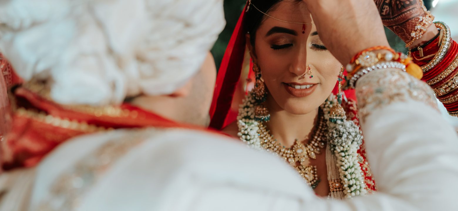 This image represents Beats in the Moment, a leading wedding photography brand in Mumbai, India, known for cinematic wedding films, candid photography, and emotional storytelling. The brand specializes in capturing real wedding moments with a creative and artistic approach.